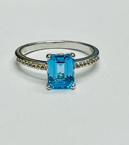 photo of Sterling silver blue topaz ring with white topaz accents item 001-220-00700