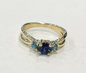photo of 10 karat yellow gold ring with center lab created alexandrite and accent blue zircons item 001-220-00772