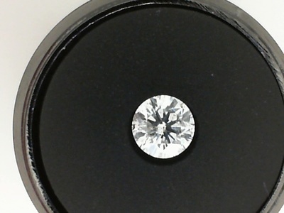 photo number one of Loose round 0.70 carat natural diamond with I1 clarity H/I color item 001-105-00400