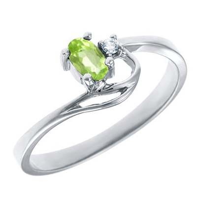 photo number one of 14 karat yellow gold peridot and diamond accented ring item 001-220-00749