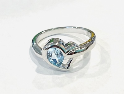 photo number one of Sterling silver blue topaz ring item 001-220-00760
