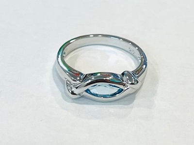 photo number one of Sterling silver blue topaz ring item 001-220-00761