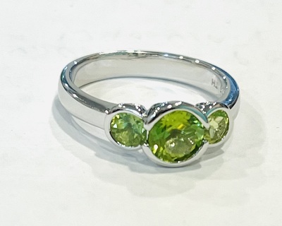 photo number one of Sterling silver peridot ring item 001-220-00770