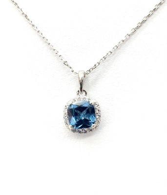 photo number one of Sterling silver with lab created December and cz halo pendant with 18'' chain item 001-230-01316