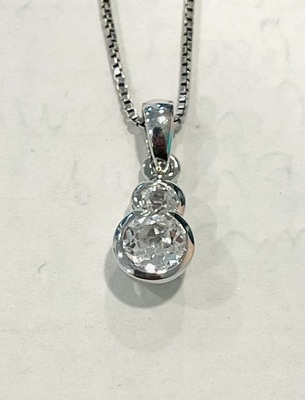 photo number one of Sterling silver created white sapphire pendant on 18