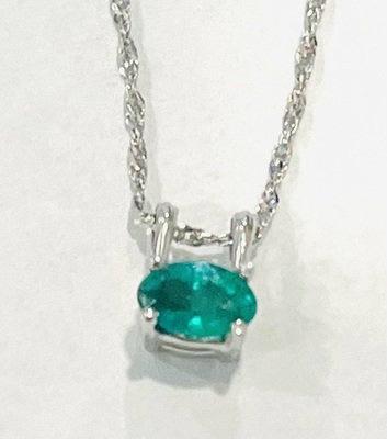 photo number one of 10 karat white gold oval emerald 6x4 pendant on 18'' singapore chain item 001-230-01379
