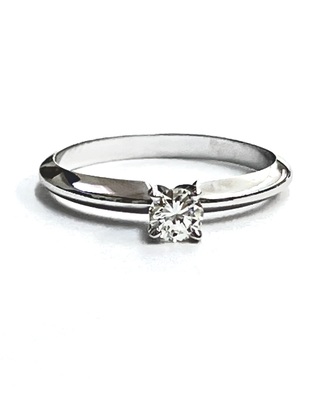 photo number one of 10 karat white gold solitaire with 14 karat white gold prongs and 0.22 carat round natural diamond item 001-421-00027