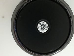 photo of Loose round 0.37 carat natural diamond with I1 clarity G/H color item 001-105-00399
