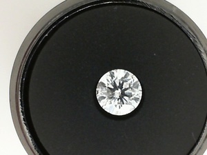 photo of Loose round 0.70 carat natural diamond with I1 clarity H/I color item 001-105-00400