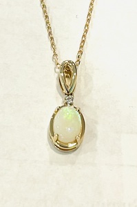photo of 10 karat yellow gold opal and diamond pendant on an 18'' chain item 001-230-01350