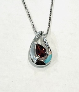 photo of Sterling silver garnet pendant on an 18'' chain item 001-230-01351