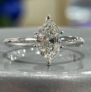 photo of 14 karat white gold solitaire with 0.97 carat natural marquise diamond SI2 clarity and H color item 001-421-00042