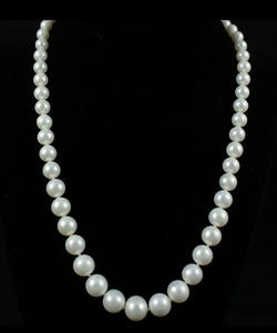 photo of 18'' strand of graduated 7mm to 11mm freshwater pearls with a 14 karat yellow gold clasp item 001-610-00848