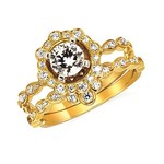 icon number one of 14 karat yellow gold wedding set with 0.88 carat total weight accent diamonds and 0.72 carat round center diamond item 001-422-00004